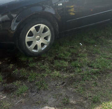 Чорний Ауді А4, об'ємом двигуна 1.6 л та пробігом 324 тис. км за 4900 $, фото 1 на Automoto.ua