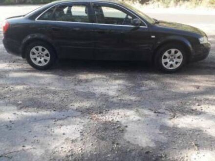 Черный Ауди А4, объемом двигателя 1.6 л и пробегом 213 тыс. км за 5000 $, фото 1 на Automoto.ua