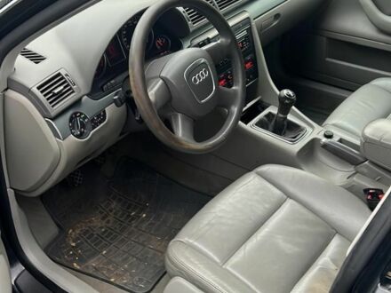 Черный Ауди А4, объемом двигателя 2 л и пробегом 300 тыс. км за 3600 $, фото 1 на Automoto.ua