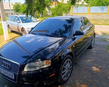 Черный Ауди А4, объемом двигателя 2 л и пробегом 314 тыс. км за 6000 $, фото 1 на Automoto.ua