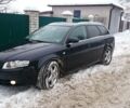 Чорний Ауді А4, об'ємом двигуна 2 л та пробігом 215 тис. км за 11800 $, фото 1 на Automoto.ua