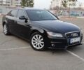 Чорний Ауді А4, об'ємом двигуна 2 л та пробігом 245 тис. км за 11899 $, фото 1 на Automoto.ua