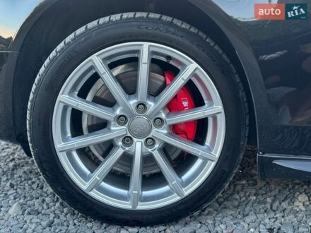 Чорний Ауді А4, об'ємом двигуна 2 л та пробігом 233 тис. км за 12999 $, фото 1 на Automoto.ua