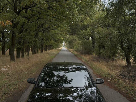 Черный Ауди А4, объемом двигателя 2 л и пробегом 245 тыс. км за 12200 $, фото 1 на Automoto.ua