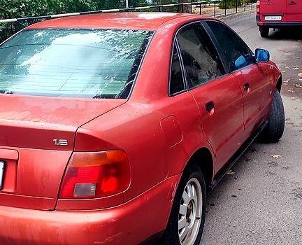 Красный Ауди А4, объемом двигателя 1.8 л и пробегом 200 тыс. км за 2250 $, фото 1 на Automoto.ua