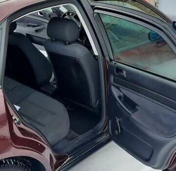 Красный Ауди А4, объемом двигателя 1.8 л и пробегом 255 тыс. км за 3500 $, фото 15 на Automoto.ua