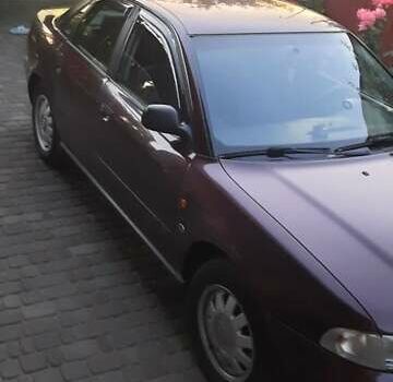 Красный Ауди А4, объемом двигателя 1.8 л и пробегом 255 тыс. км за 3500 $, фото 2 на Automoto.ua