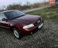 Красный Ауди А4, объемом двигателя 1.6 л и пробегом 268 тыс. км за 3750 $, фото 1 на Automoto.ua
