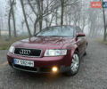 Красный Ауди А4, объемом двигателя 1.6 л и пробегом 299 тыс. км за 4599 $, фото 1 на Automoto.ua