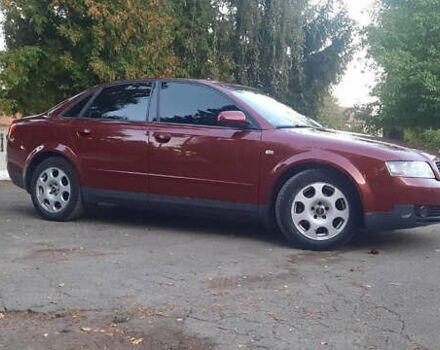 Красный Ауди А4, объемом двигателя 1.6 л и пробегом 300 тыс. км за 4900 $, фото 1 на Automoto.ua