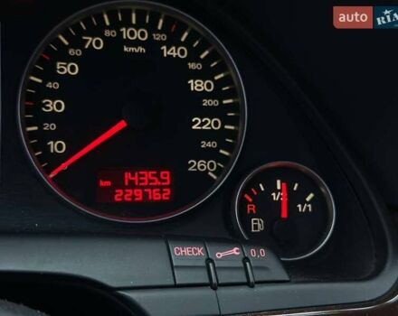 Красный Ауди А4, объемом двигателя 1.98 л и пробегом 229 тыс. км за 7300 $, фото 26 на Automoto.ua