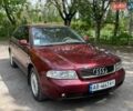 Красный Ауди А4, объемом двигателя 1.8 л и пробегом 257 тыс. км за 4399 $, фото 1 на Automoto.ua