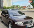 Красный Ауди А4, объемом двигателя 2.5 л и пробегом 397 тыс. км за 5800 $, фото 1 на Automoto.ua