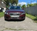 Красный Ауди А4, объемом двигателя 1.8 л и пробегом 238 тыс. км за 9000 $, фото 1 на Automoto.ua