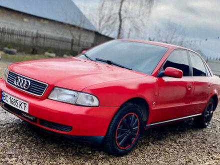 Красный Ауди А4, объемом двигателя 1.6 л и пробегом 300 тыс. км за 2999 $, фото 1 на Automoto.ua