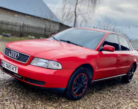 Красный Ауди А4, объемом двигателя 1.6 л и пробегом 300 тыс. км за 2999 $, фото 1 на Automoto.ua