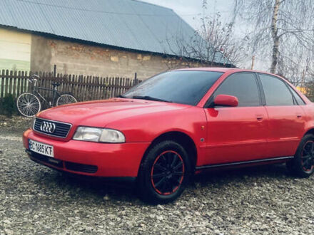 Красный Ауди А4, объемом двигателя 1.6 л и пробегом 300 тыс. км за 2650 $, фото 1 на Automoto.ua