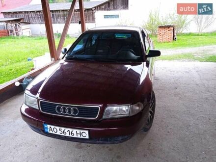 Красный Ауди А4, объемом двигателя 1.6 л и пробегом 354 тыс. км за 3500 $, фото 1 на Automoto.ua