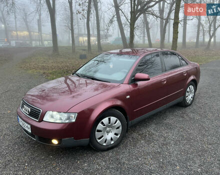 Красный Ауди А4, объемом двигателя 1.6 л и пробегом 299 тыс. км за 4599 $, фото 1 на Automoto.ua