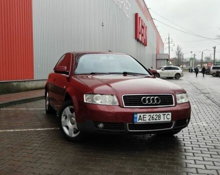 Красный Ауди А4, объемом двигателя 1.8 л и пробегом 240 тыс. км за 5850 $, фото 1 на Automoto.ua