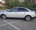 Серый Ауди А4, объемом двигателя 2 л и пробегом 301 тыс. км за 5050 $, фото 1 на Automoto.ua