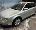 Серый Ауди А4, объемом двигателя 2 л и пробегом 393 тыс. км за 5500 $, фото 1 на Automoto.ua