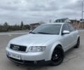 Серый Ауди А4, объемом двигателя 2 л и пробегом 295 тыс. км за 4700 $, фото 1 на Automoto.ua