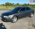 Сірий Ауді А4, об'ємом двигуна 2.5 л та пробігом 245 тис. км за 3499 $, фото 1 на Automoto.ua