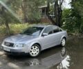 Сірий Ауді А4, об'ємом двигуна 2 л та пробігом 297 тис. км за 4483 $, фото 1 на Automoto.ua