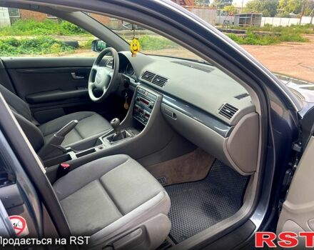 Серый Ауди А4, объемом двигателя 2 л и пробегом 210 тыс. км за 4600 $, фото 4 на Automoto.ua