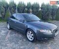 Сірий Ауді А4, об'ємом двигуна 2 л та пробігом 284 тис. км за 7050 $, фото 1 на Automoto.ua