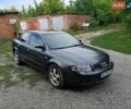 Серый Ауди А4, объемом двигателя 1.78 л и пробегом 200 тыс. км за 3800 $, фото 1 на Automoto.ua