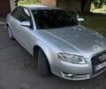 Сірий Ауді А4, об'ємом двигуна 2 л та пробігом 402 тис. км за 6950 $, фото 1 на Automoto.ua