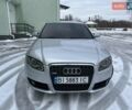 Сірий Ауді А4, об'ємом двигуна 2 л та пробігом 345 тис. км за 5600 $, фото 1 на Automoto.ua
