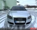 Сірий Ауді А4, об'ємом двигуна 2 л та пробігом 258 тис. км за 5600 $, фото 1 на Automoto.ua