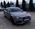Серый Ауди А4, объемом двигателя 2 л и пробегом 300 тыс. км за 9500 $, фото 1 на Automoto.ua