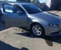 Сірий Ауді А4, об'ємом двигуна 2 л та пробігом 253 тис. км за 7971 $, фото 1 на Automoto.ua