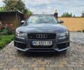 Сірий Ауді А4, об'ємом двигуна 2 л та пробігом 244 тис. км за 10500 $, фото 1 на Automoto.ua