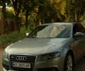 Сірий Ауді А4, об'ємом двигуна 2 л та пробігом 260 тис. км за 7900 $, фото 1 на Automoto.ua