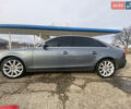 Сірий Ауді А4, об'ємом двигуна 2 л та пробігом 244 тис. км за 11400 $, фото 1 на Automoto.ua