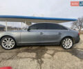 Сірий Ауді А4, об'ємом двигуна 2 л та пробігом 244 тис. км за 11800 $, фото 1 на Automoto.ua