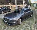Сірий Ауді А4, об'ємом двигуна 2 л та пробігом 160 тис. км за 12600 $, фото 1 на Automoto.ua