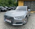 Сірий Ауді А4, об'ємом двигуна 2 л та пробігом 174 тис. км за 13500 $, фото 1 на Automoto.ua