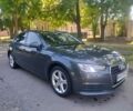 Сірий Ауді А4, об'ємом двигуна 2 л та пробігом 244 тис. км за 17449 $, фото 1 на Automoto.ua