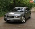 Сірий Ауді А4, об'ємом двигуна 2 л та пробігом 234 тис. км за 5300 $, фото 1 на Automoto.ua