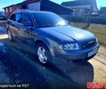 Серый Ауди А4, объемом двигателя 2 л и пробегом 300 тыс. км за 5500 $, фото 1 на Automoto.ua