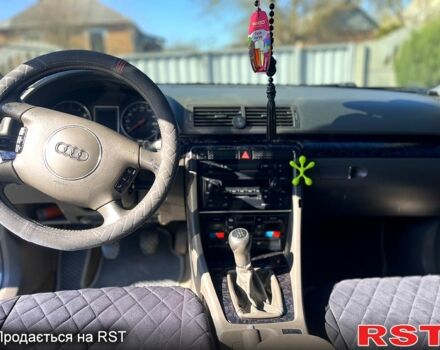 Серый Ауди А4, объемом двигателя 2 л и пробегом 300 тыс. км за 5500 $, фото 2 на Automoto.ua