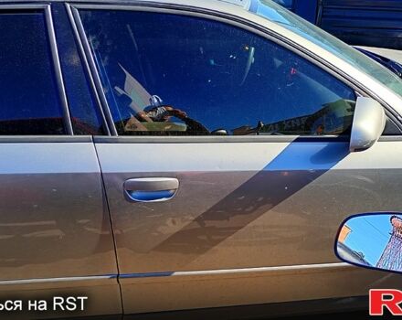 Серый Ауди А4, объемом двигателя 2 л и пробегом 200 тыс. км за 3800 $, фото 1 на Automoto.ua