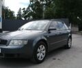 Сірий Ауді А4, об'ємом двигуна 2 л та пробігом 266 тис. км за 3999 $, фото 1 на Automoto.ua