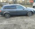 Сірий Ауді А4, об'ємом двигуна 2 л та пробігом 330 тис. км за 5950 $, фото 1 на Automoto.ua